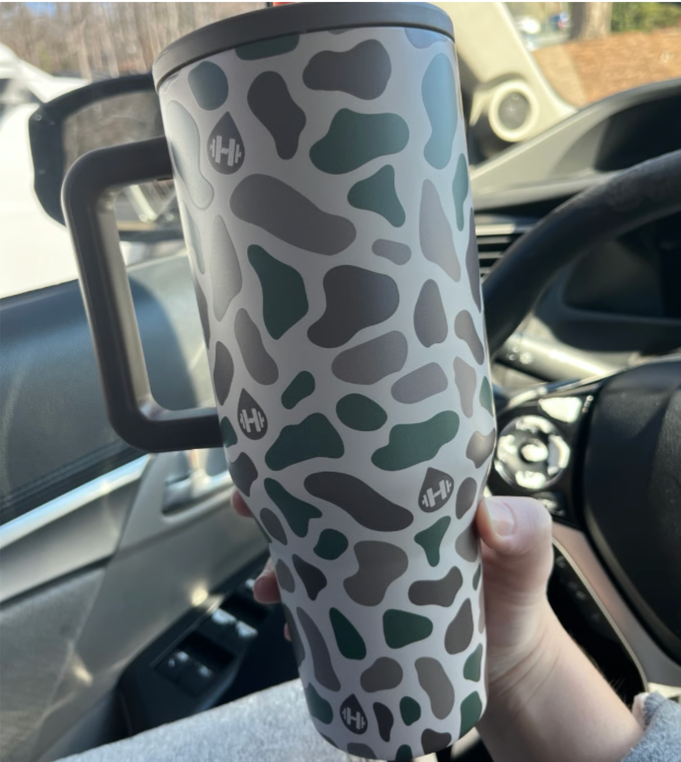 Customer review — Duck Camo Traveler — in car (UGC)