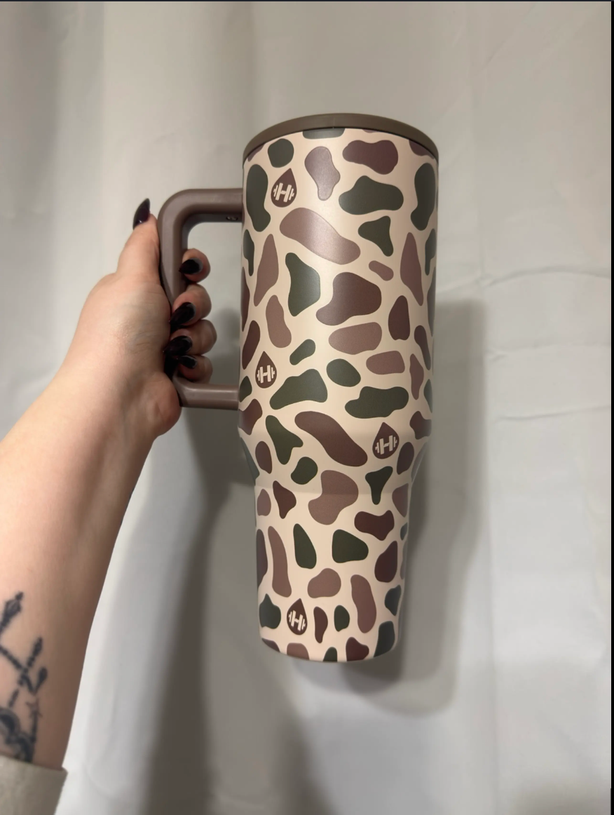 Customer review — Duck Camo Traveler — held in hand